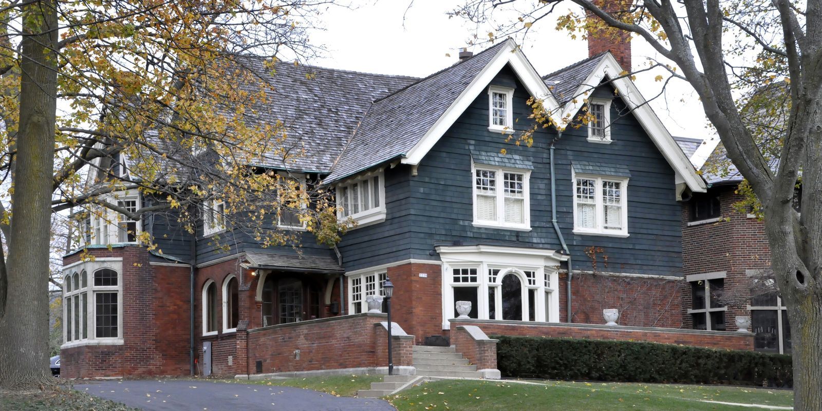 Historical home with custom invisible storm windows installed on the outside