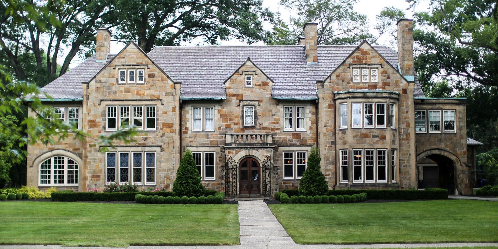 Historical mansion with custom invisible storm windows installed