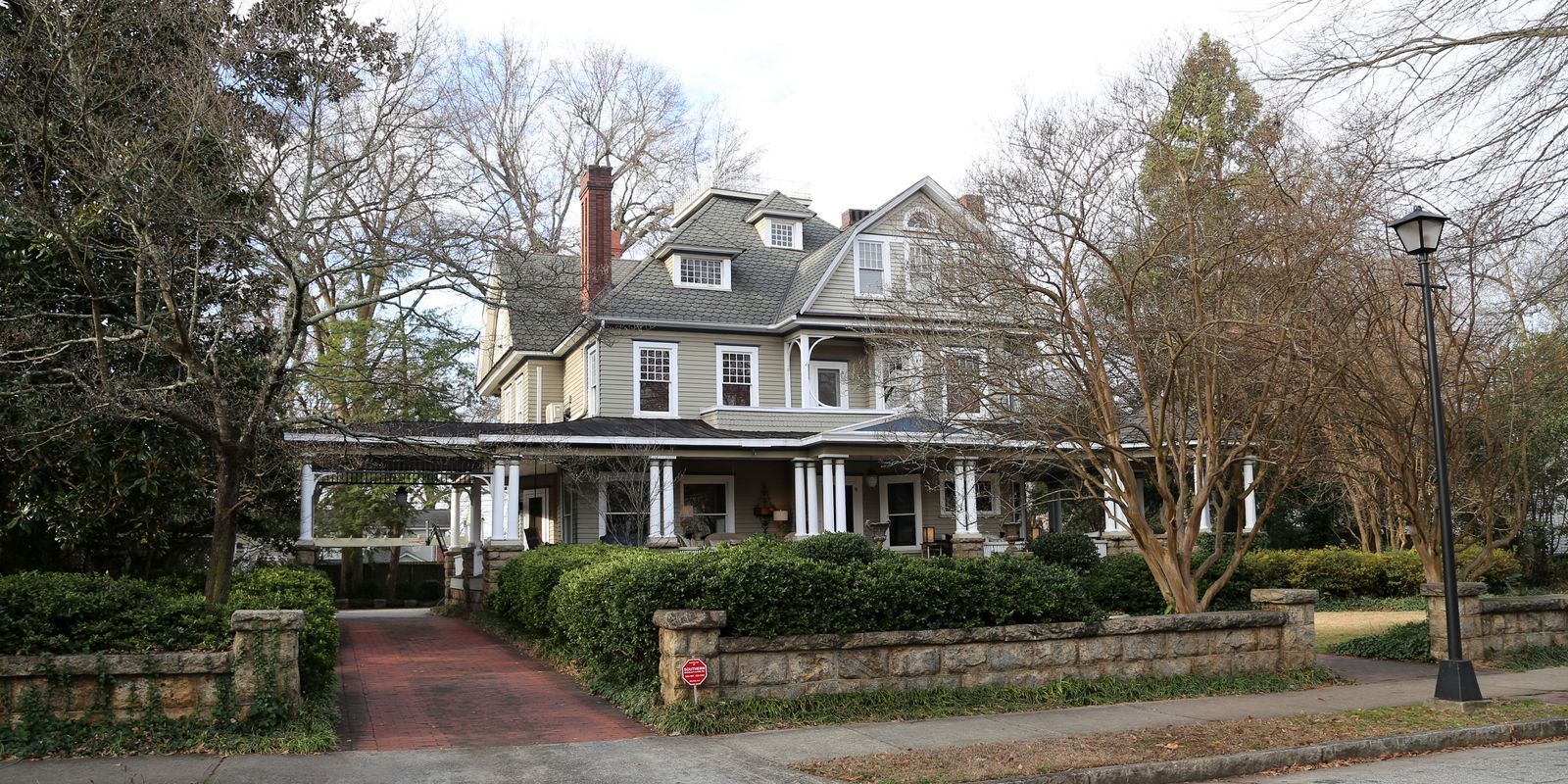 custom storm windows installed on historical home