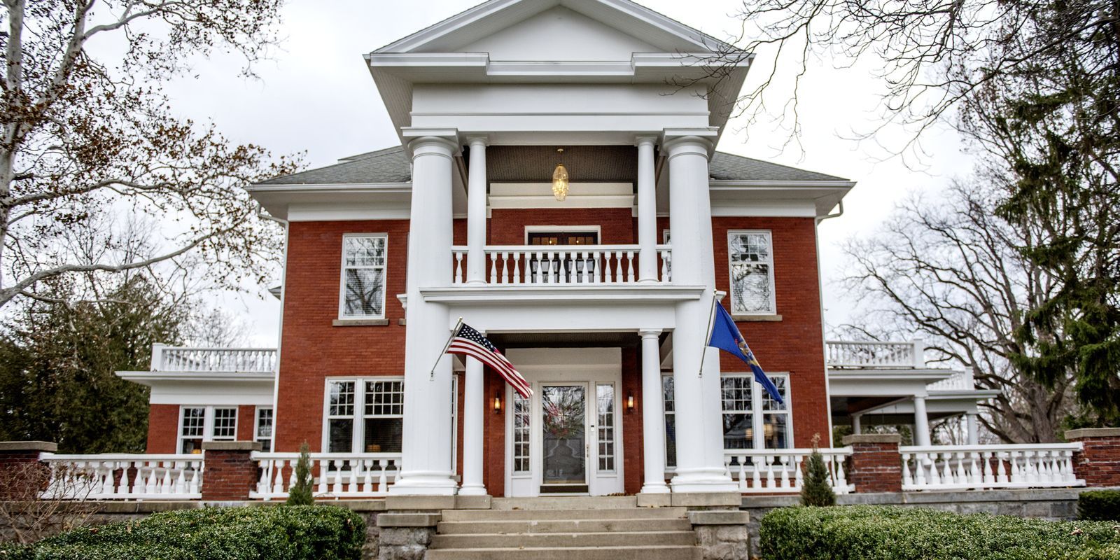 Historic home restored with custom invisible storm windows